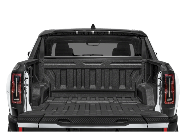 Rear view of 2026 GMC Hummer EV Pickup with open truck bed
