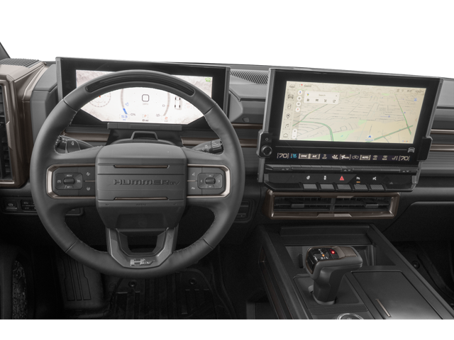 Close up view of 2026 GMC Hummer EV Pickup front dashboard from the drivers point of view. Steering wheel, temperature controls, gear shift and touch screen are visible.