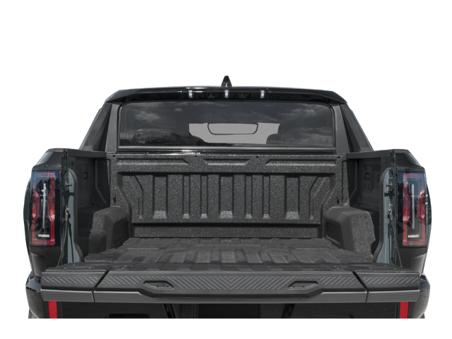 Rear view of 2026 GMC Hummer EV Pickup with open truck bed