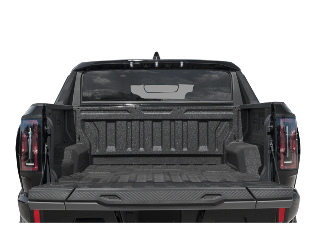 Rear view of 2026 GMC Hummer EV Pickup with open truck bed