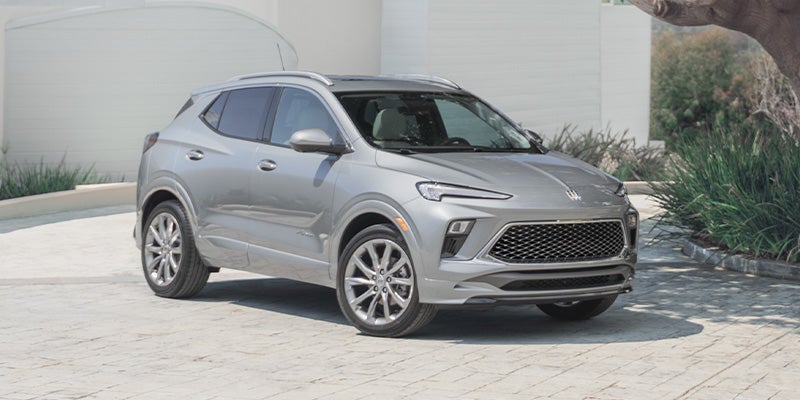 Front side view of 2025 Buick Encore GX on a residential driveway