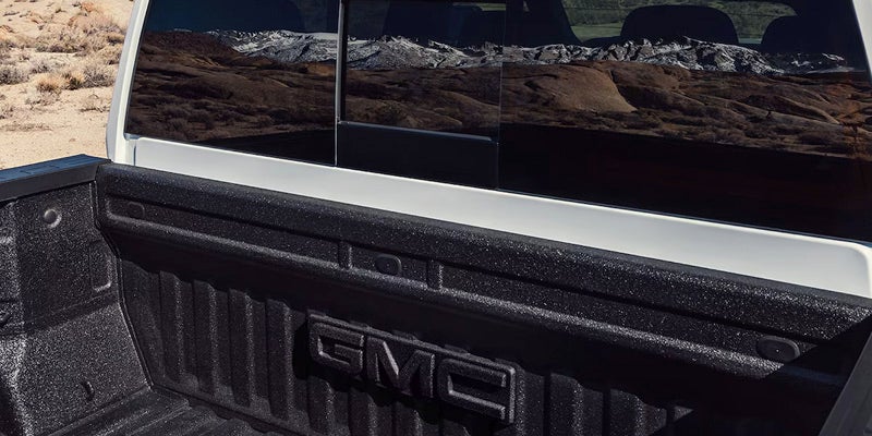 Close up view of 2025 GMC Sierra HD truck bed and rear window